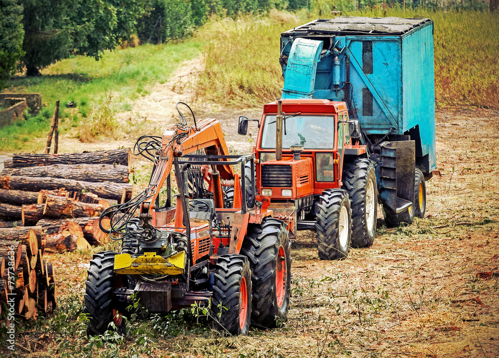 Old tractor and equipment used in timber industry. Old tractor and equipment used in timber industry.