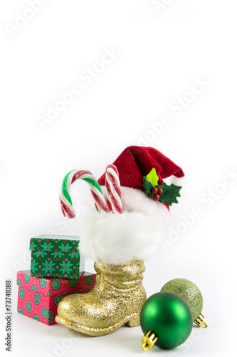 Wallpaper Mural Santas golden boots and red hat with presents isolated Torontodigital.ca