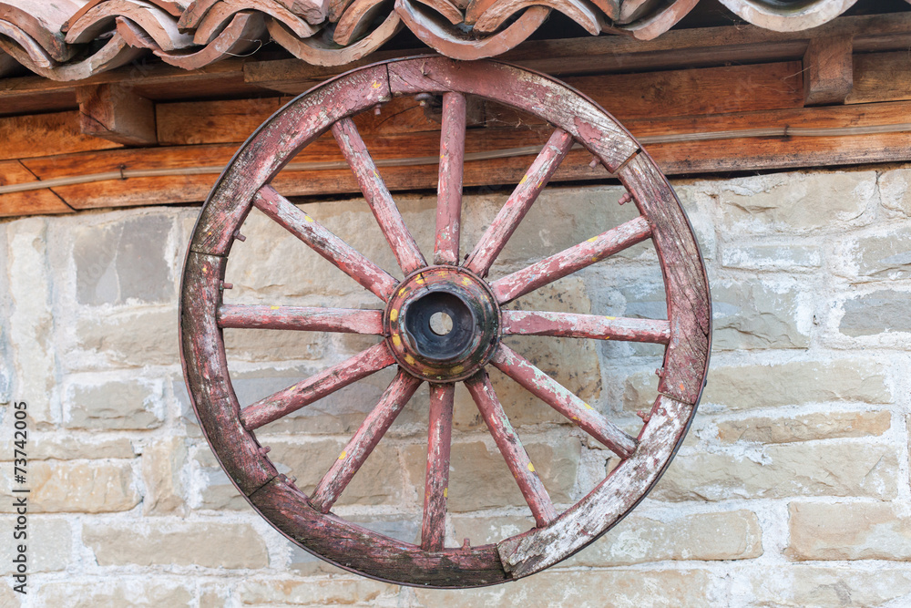 old wagon wheel on the wall