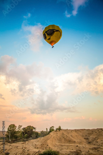 yellow balloon above the earth © Olexandr
