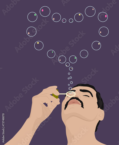 man blowing soap bubbles