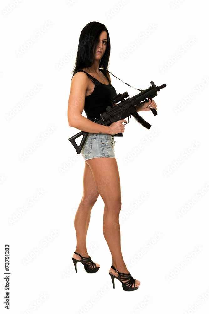 Beautiful woman with gun 