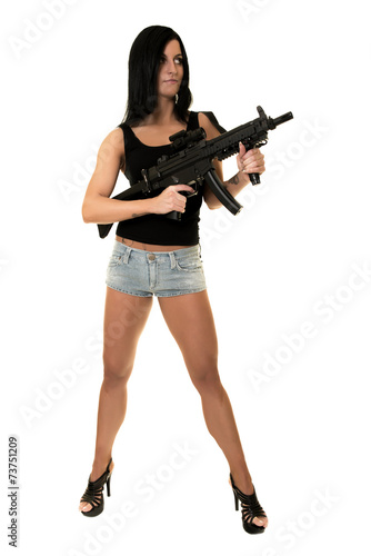 Beautiful woman with gun 