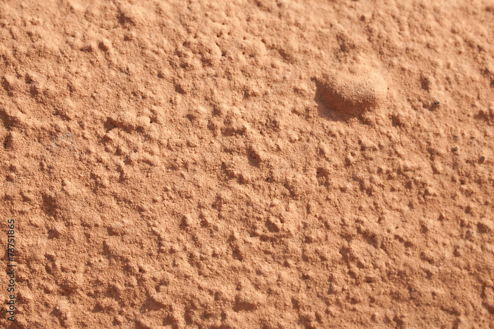 bumped plaster texture background in sunglight bumped plaster texture background in sunglight