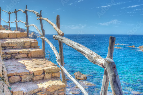 Photos wooden banister by the sea