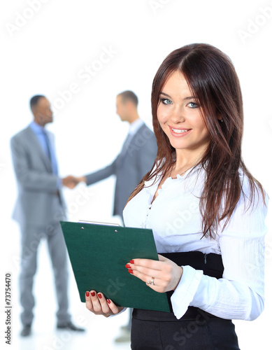 Portrrait of a smiling young business woman with people