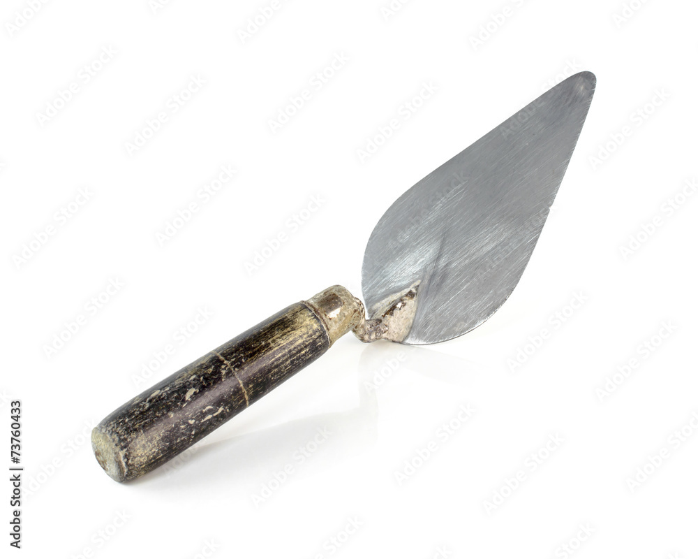 Fototapeta premium Used trowel, isolated on a white background