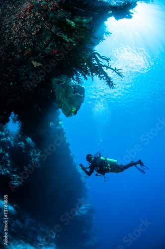 Diver swimming around in Banda, Indonesia underwater photo