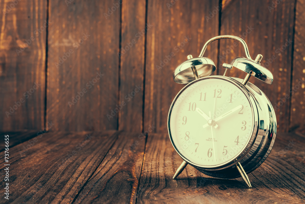 Clock on wood background Clock on wood background