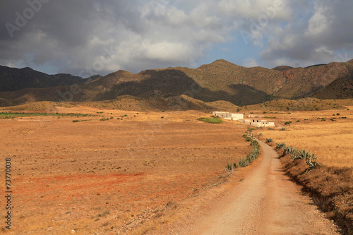 cortijo de genoveses carretera cielo con nubes almería 5675-f14 photo