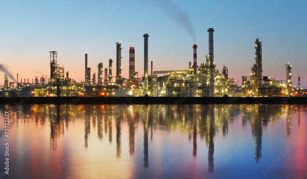 Oil and gas refinery at twilight with reflection - factory - pet