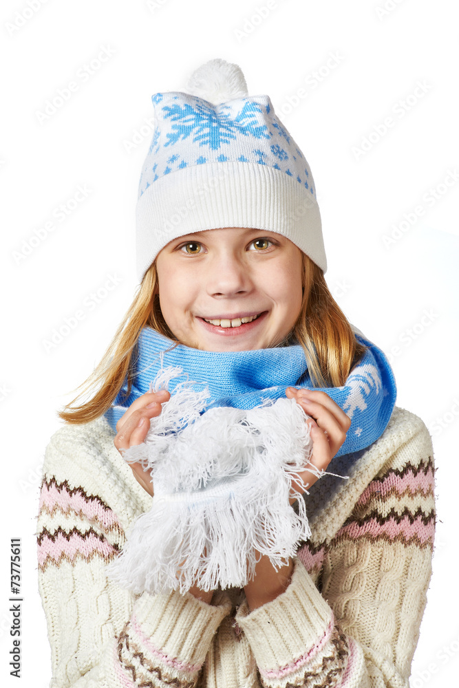 Beautiful girl in knit sweaters, scarves and hats isolated Beautiful girl in knit sweaters, scarves and hats isolated