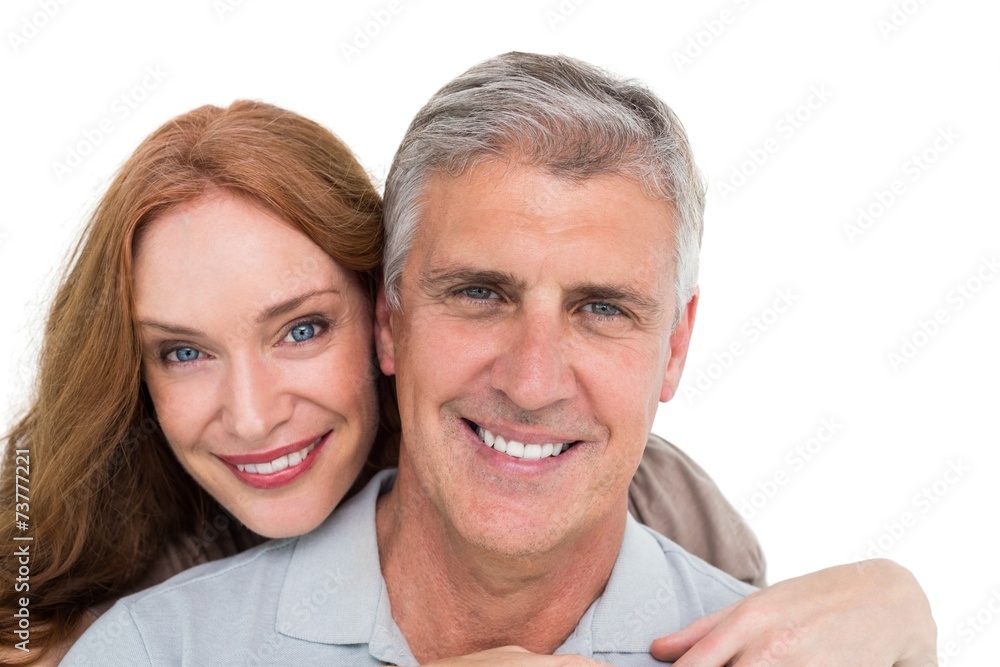 Casual couple hugging and smiling Casual couple hugging and smiling