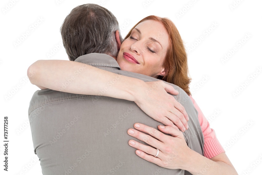 Casual couple hugging each other Casual couple hugging each other
