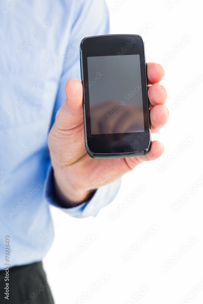 Businessman showing his smartphone to camera Businessman showing his smartphone to camera
