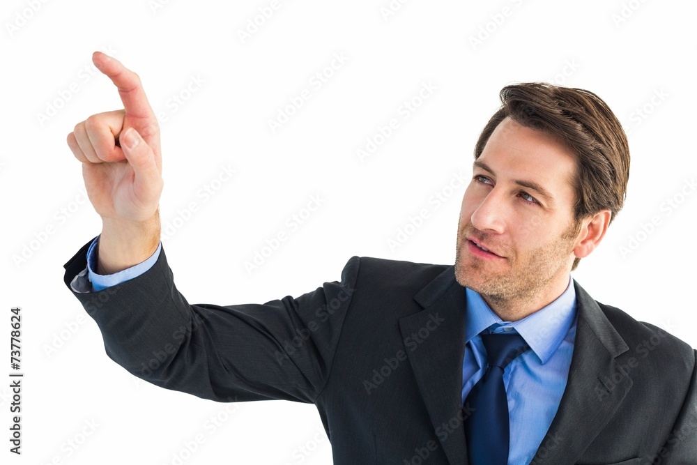 Serious businessman pointing at something Serious businessman pointing at something