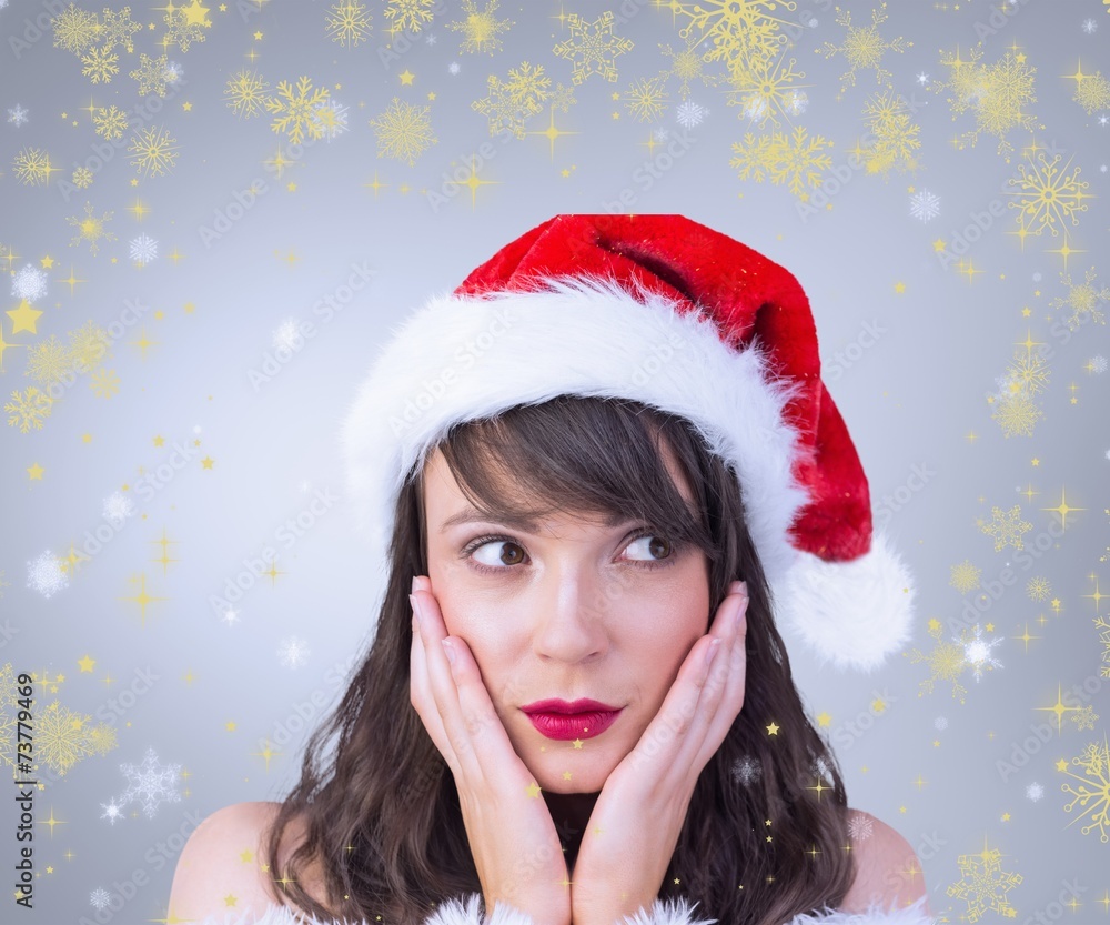 Composite image of pretty santa girl with hands on face Composite image of pretty santa girl with hands on face