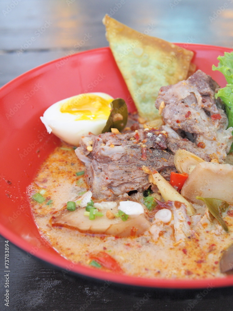 Delicious tomyam pork born with egg Delicious tomyam pork born with egg