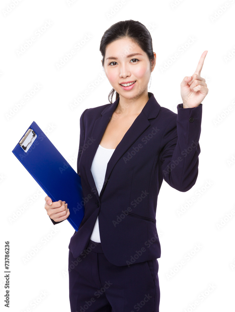 Businesswoman with clipboard and finger point up Businesswoman with clipboard and finger point up