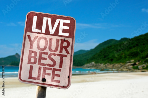 Canvas Print Live Your Best Life sign with a beach on background