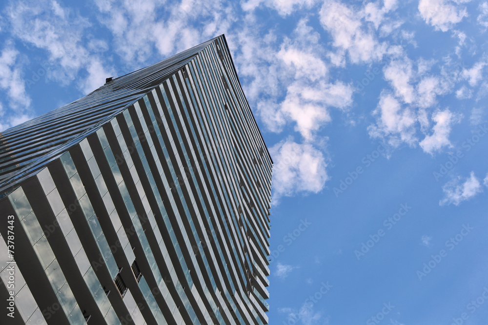glass building skyscraper, sunny day, cloudy sky glass building skyscraper, sunny day, cloudy sky
