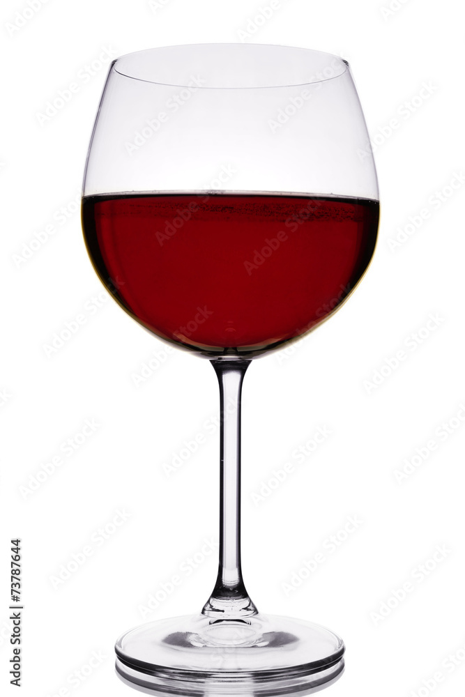 Red wine glass of wine on colorful background Red wine glass of wine on colorful background