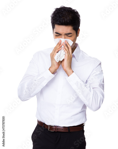 Business man sneeze