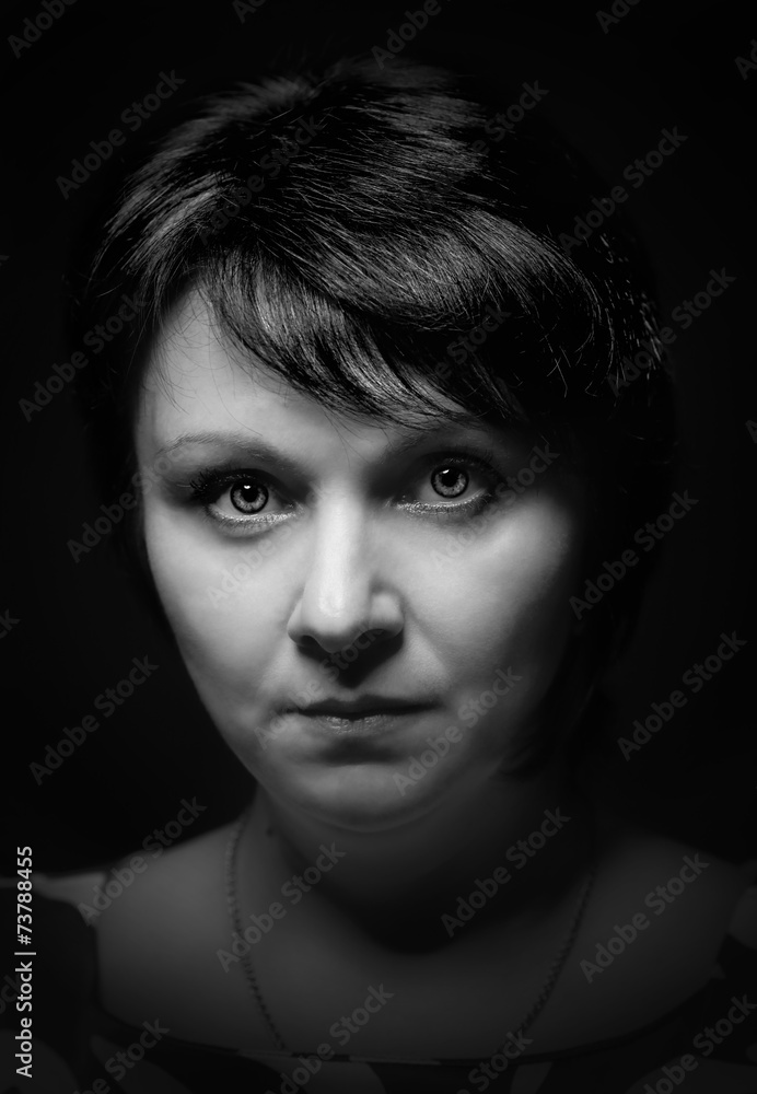 portrait of a woman with a serious look portrait of a woman with a serious look