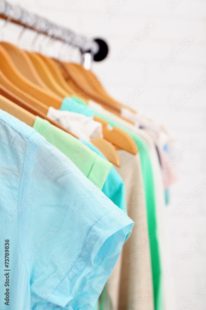 Different clothes on hangers close up Different clothes on hangers close up