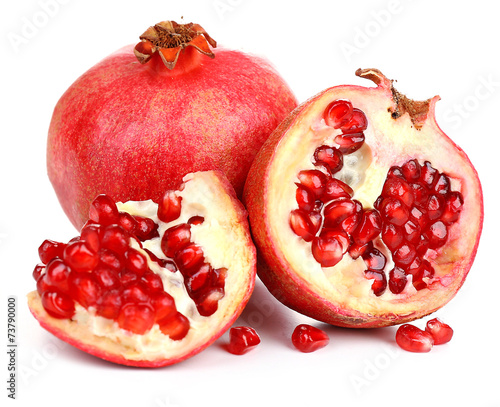 Juicy ripe pomegranates, isolated on white