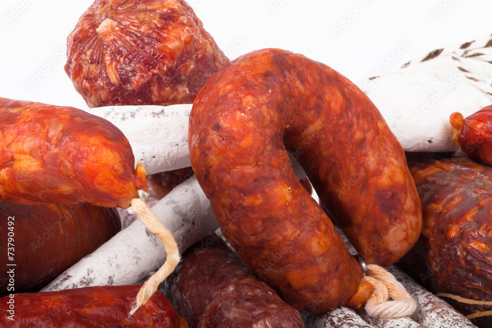 Fototapeta premium several types of sausages on a light background