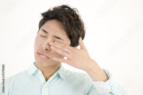Tired asian man