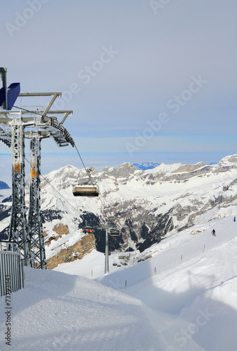Chair lift, ski resort in Alps. Titlis, Engelberg, Switzerland