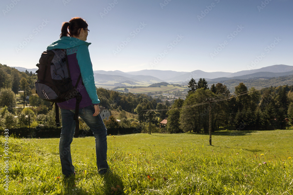Girl looks out over the mountains, Czech mountains Jesenik
