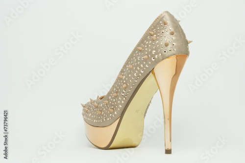 Gold shoe with spikes 