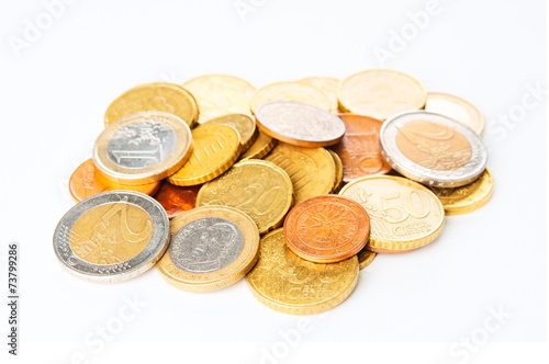 Heap of Euro coins on white background