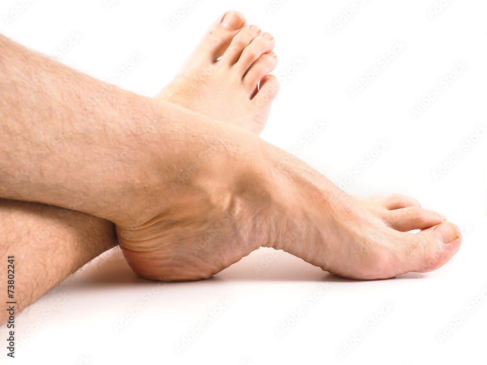 Hairy legs and feet of male person resting towards white backgro Stock  Photo | Adobe Stock