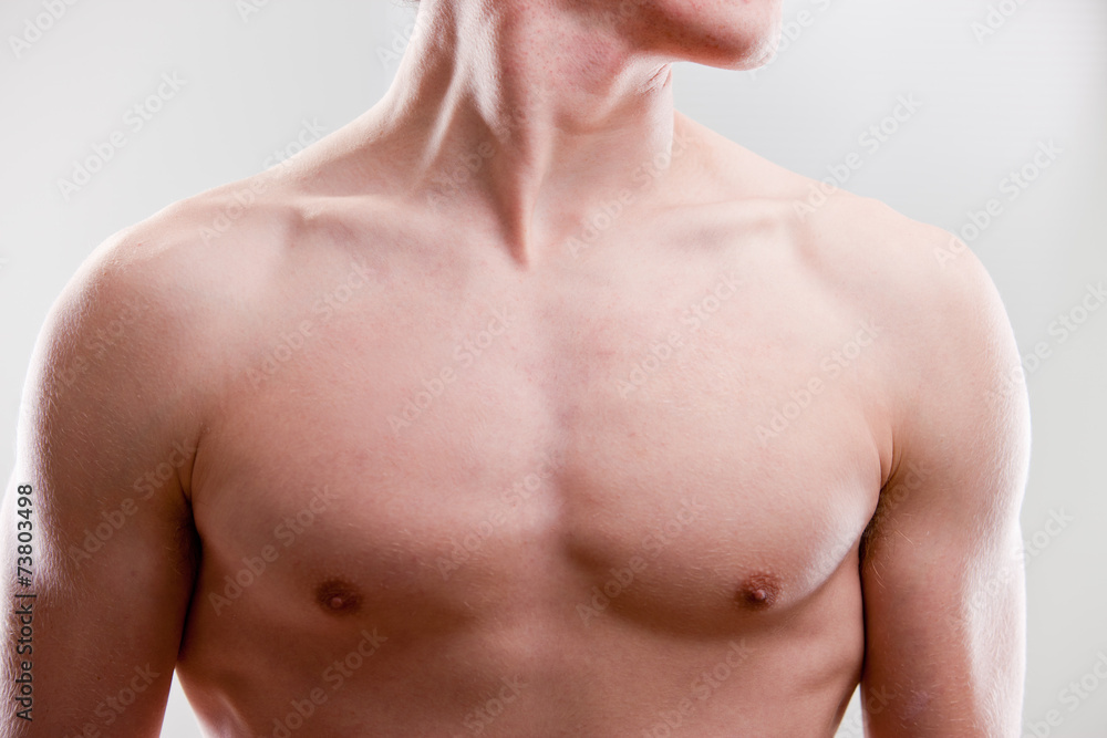 chest and neck of a young strong man chest and neck of a young strong man