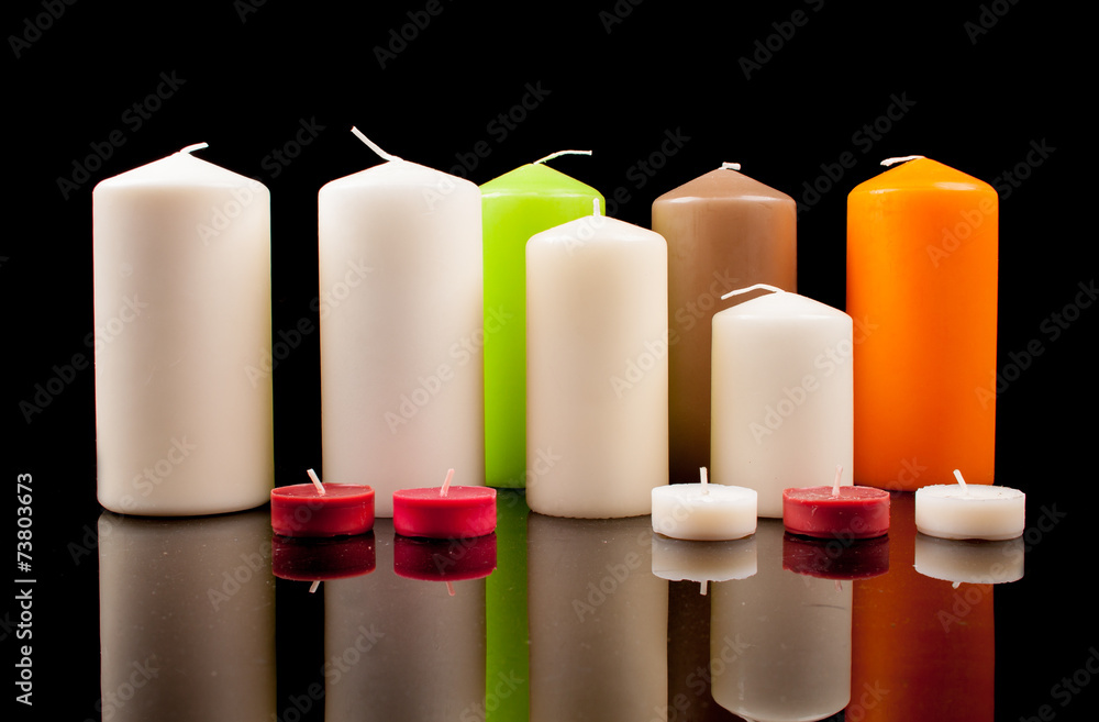 Christmas candles on a black background Christmas candles on a black background