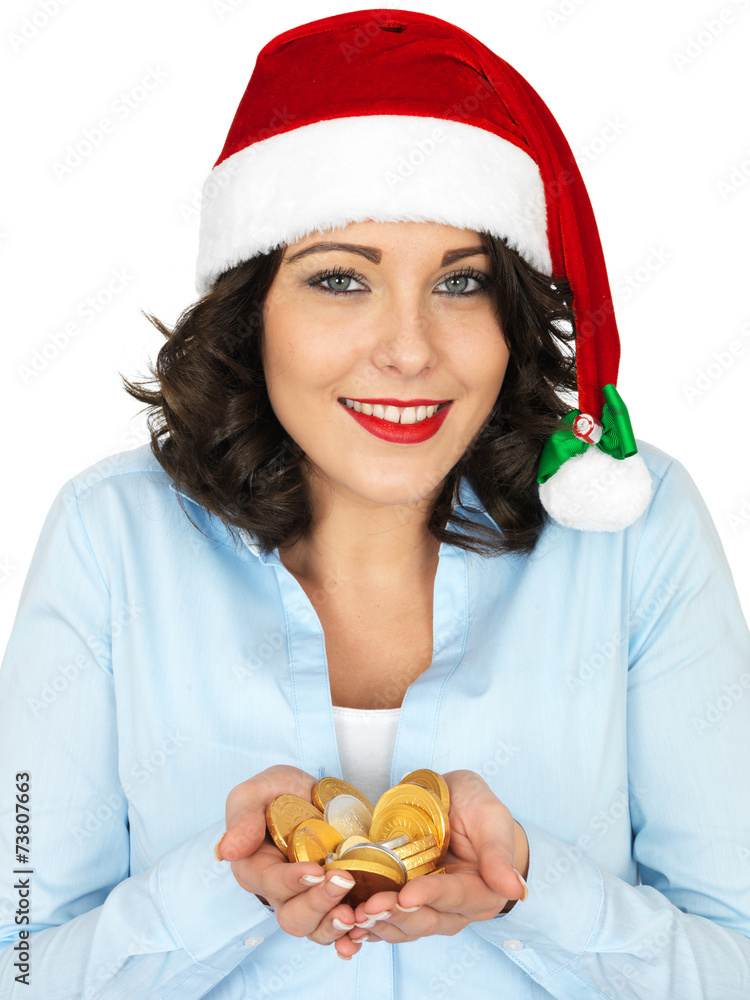 Young Woman in Santa Hat Holding Chocolate Money Young Woman in Santa Hat Holding Chocolate Money