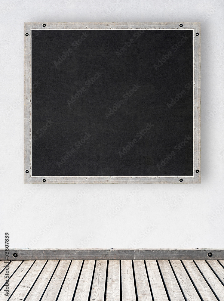 Fototapeta premium white stucco wall with chalkboard