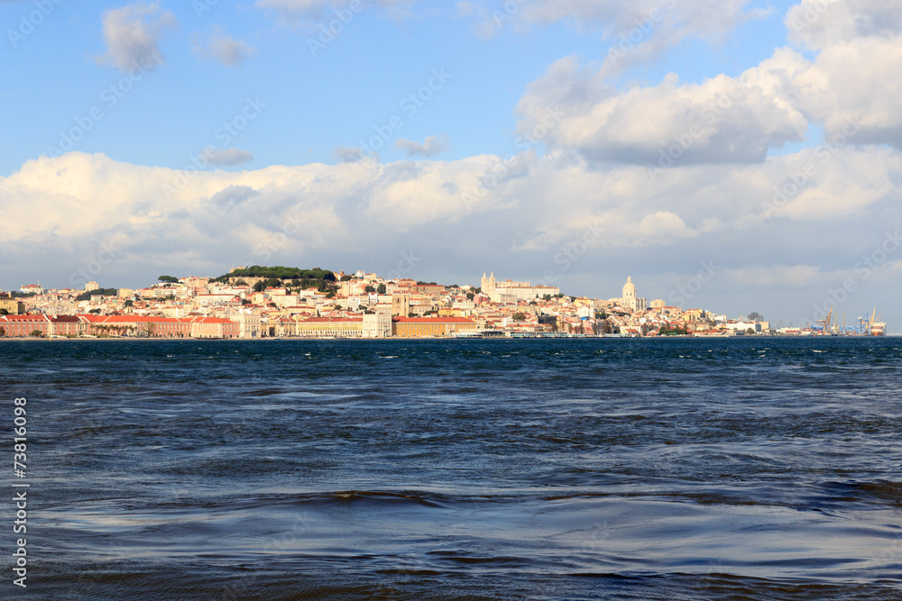 View across river Tagus towards historic city of Lisbon