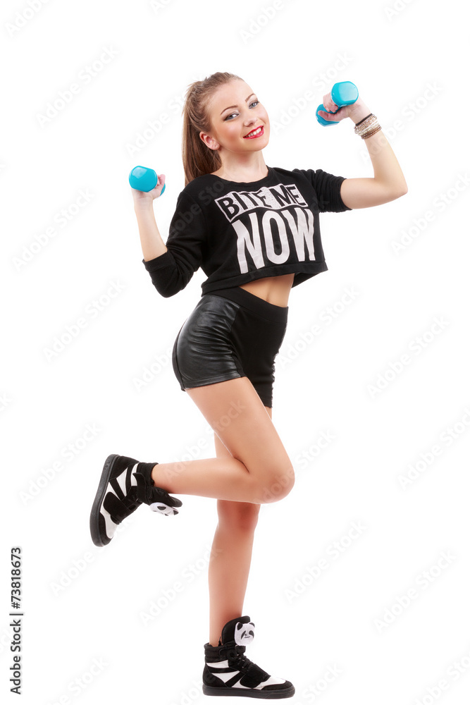 Happy fitness woman lifting dumbbells smiling cheerful, fresh an Happy fitness woman lifting dumbbells smiling cheerful, fresh an