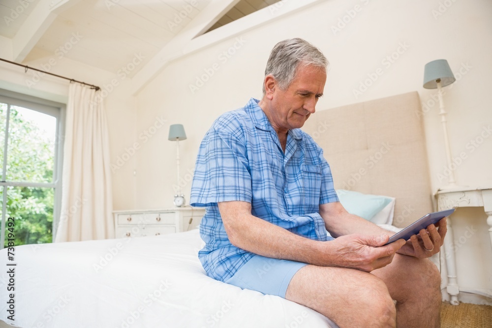 Senior man using tablet pc Senior man using tablet pc