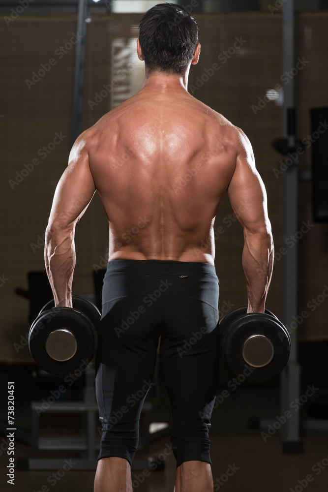 Fit Athlete Doing Exercise For Trapezius