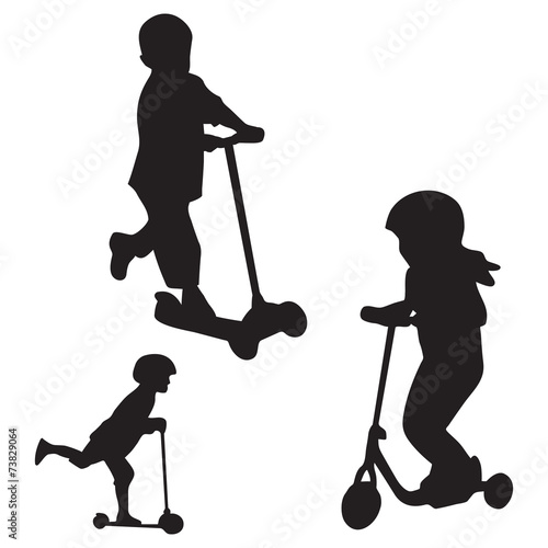 silhouette kids on the scooter