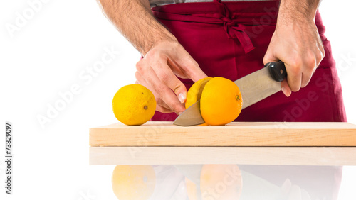 Chef making orange juice