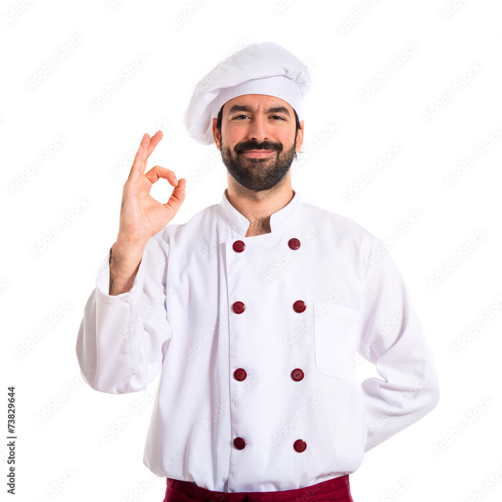 Chef making Ok sign over white background Chef making Ok sign over white background