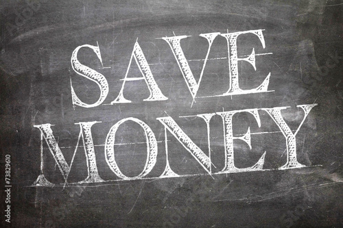 Save Money written on blackboard