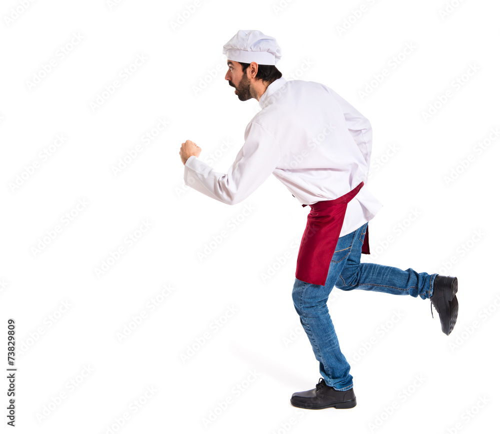 Chef running fast over white background Chef running fast over white background